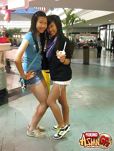 Asian girlfriends posing for..